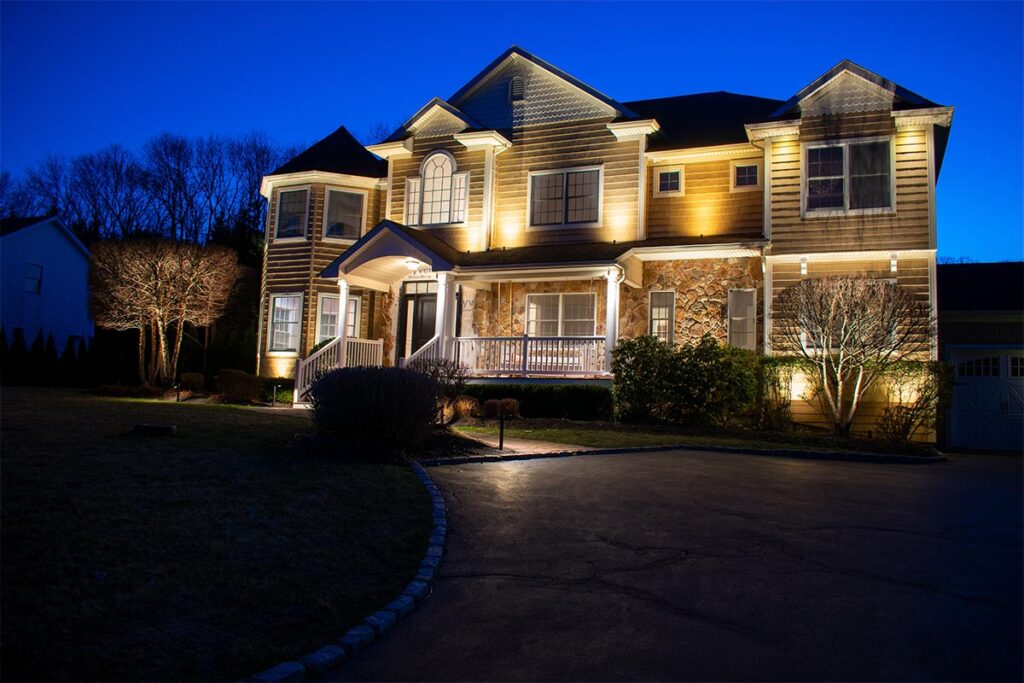 Architectural details highlighted with energy-efficient low voltage outside lights.