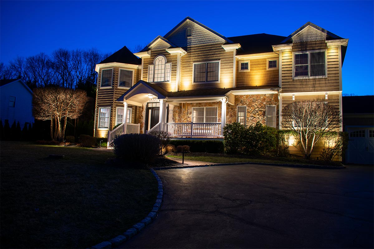 Architectural details highlighted with energy-efficient low voltage outside lights.